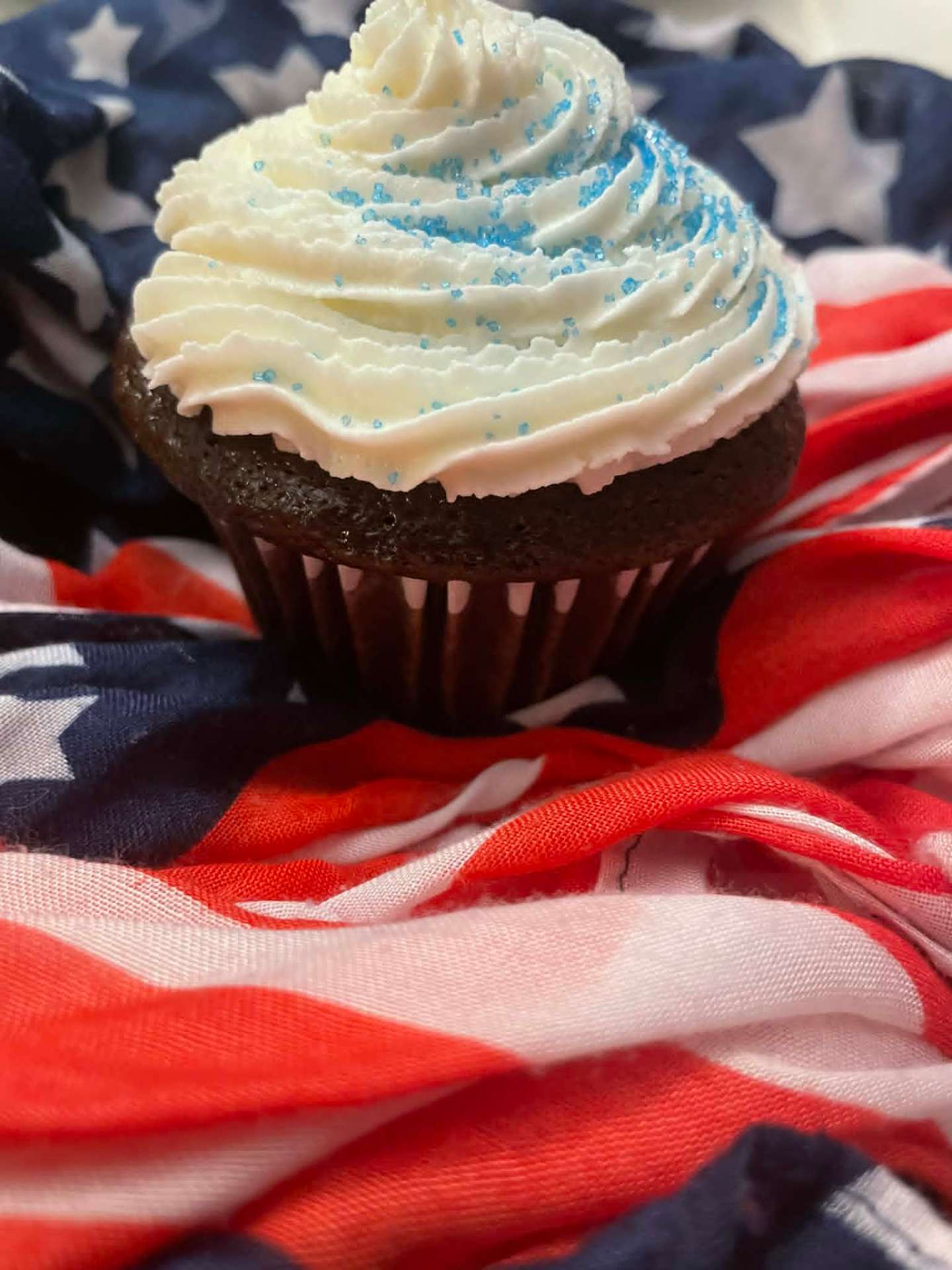 Patriotic chocolate cupcake with white frosting